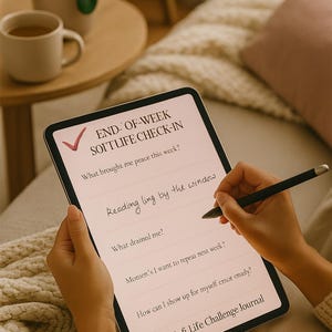 May include: A person is writing on a digital tablet with a stylus. The tablet displays a "Sofi Life Challenge Journal" with prompts for self-reflection, including "What brought me peace this week?" and "Reading ling by the window."
