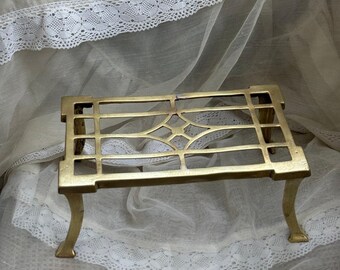 Art Deco-mässingunderlägg