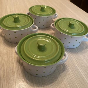 Set of 4 ceramic cooking pots with lids and handles