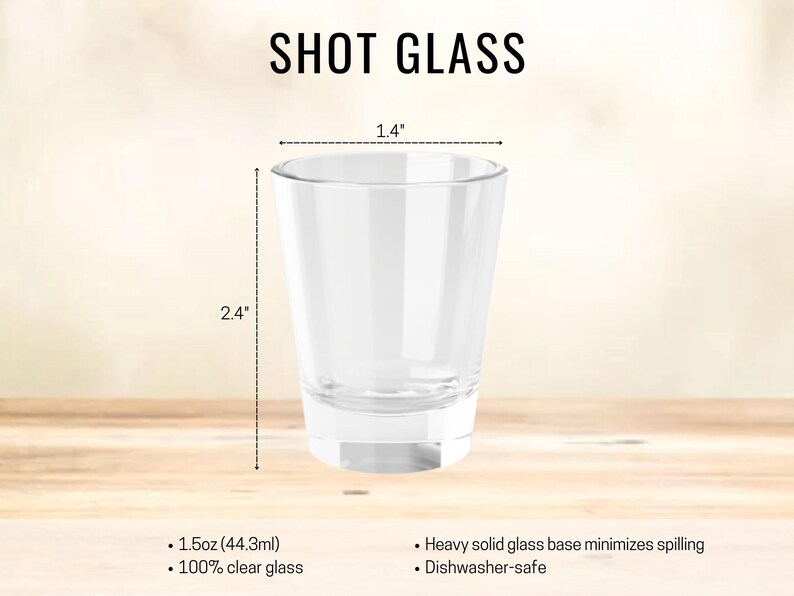 May include: Clear shot glass, 2.4 inches tall and 1.4 inches wide, with the text "SHOT GLASS". The glass holds 1.5oz (44.3ml) and has a heavy solid glass base. Dishwasher-safe.