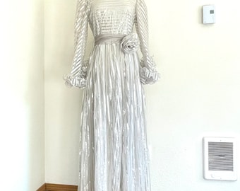 1970s Vintage KAY KIPPS New York Striped Silver Lurex Floor Length Party Gown with Ruffled Sleeves, Rosette and Sash Tie