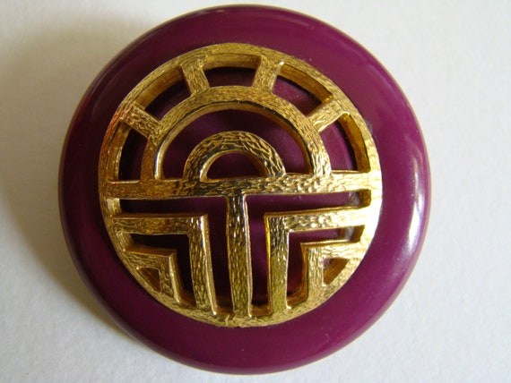 Louis Feraud purple brooch