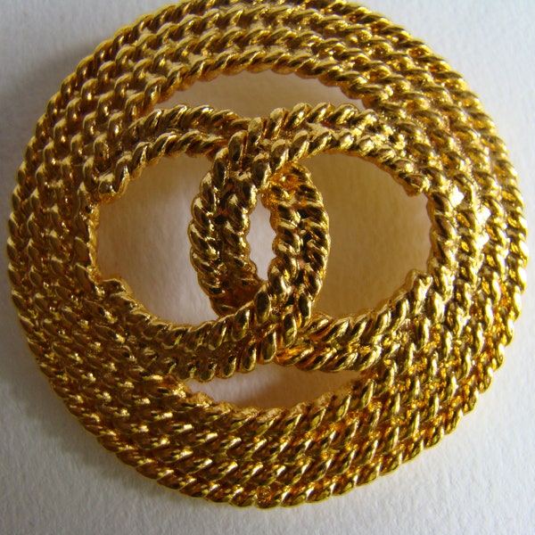 Chanel logo brooch