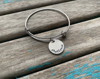 Quote Bracelet- "charisma" pendant on a stainless steel adjustable bangle bracelet- Only 1 Available- Clearance Bracelet