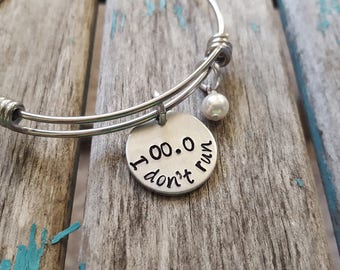 I Don’t Run Bracelet- hand-stamped "00.0 I don’t run" Bracelet with an accent bead in your choice of colors