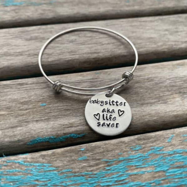 Quote Bracelet- "babysitter aka life saver" pendant on a stainless steel adjustable bangle bracelet- Only 1 Available