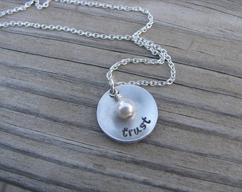 Inspirational Word Necklace- brushed silver domed disc with "trust" and an accent bead in your choice of colors- Hand-Stamped Jewelry