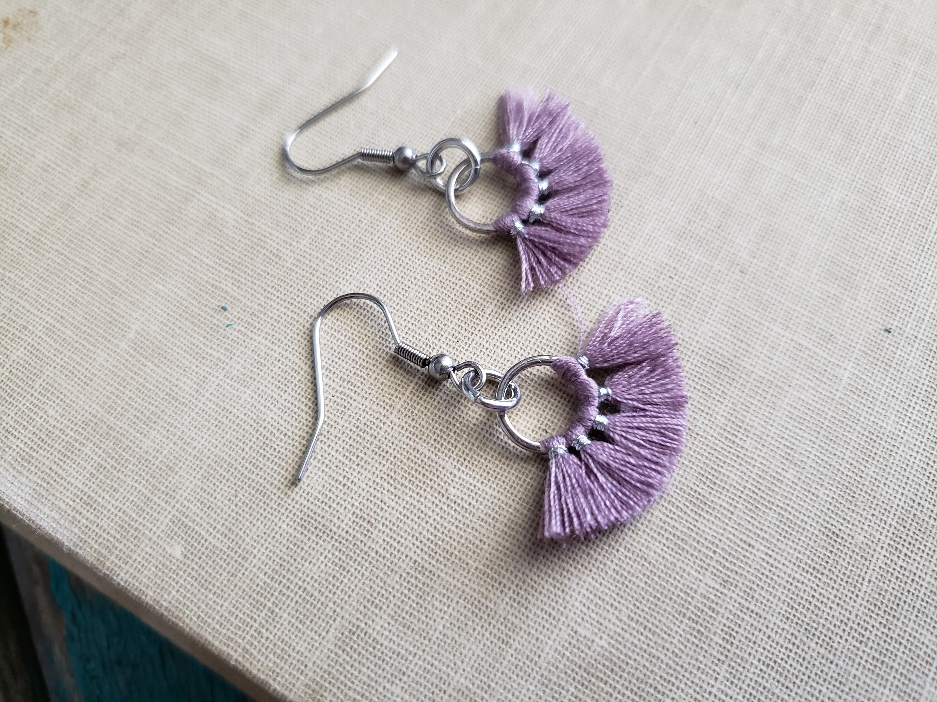 Purple fringe earrings deals