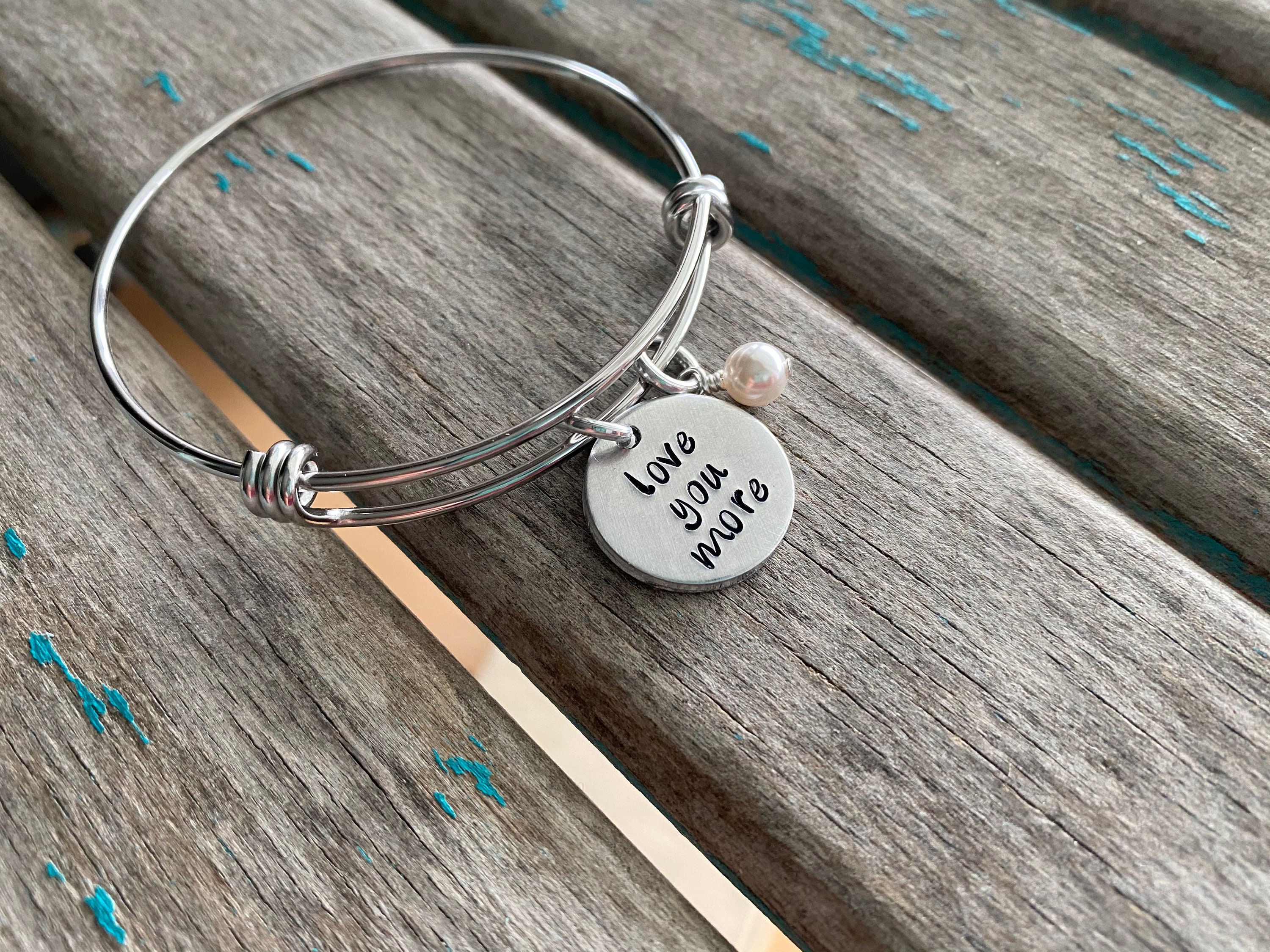 Love You More Bracelet: Hand-stamped Silver Bangle With Accent