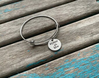 Quote Bracelet- "sister in law" pendant on a stainless steel adjustable bangle bracelet- Only 1 Available- Clearance Bracelet