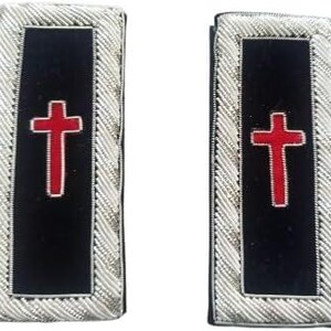 May include: A pair of rectangular shoulder boards featuring a black velvet center panel with an embroidered red cross. The edges are bordered by thick, metallic silver twisted cord trim, creating a structured and uniform appearance for formal attire.
