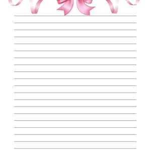 May include: A lined white paper with a pink bow and ribbon design at the top. The bow is a soft pink color, and the ribbon curls gracefully on either side. The lines are evenly spaced, creating a clean and organized look.