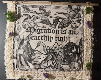Migration Is An Earthly Right Driftwood Banner
