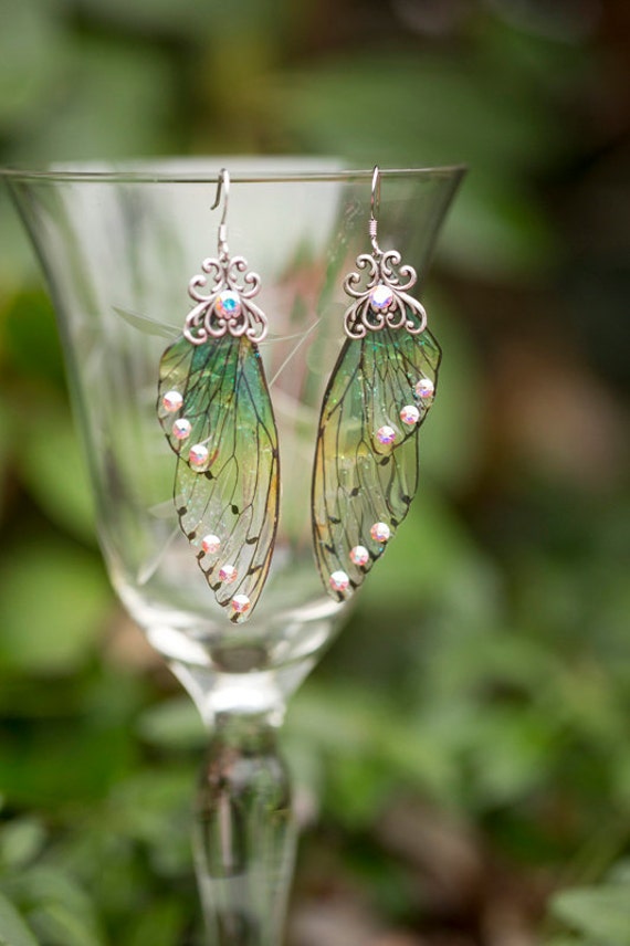 Items similar to Silver Alseid Fairy Wing earrings on Etsy