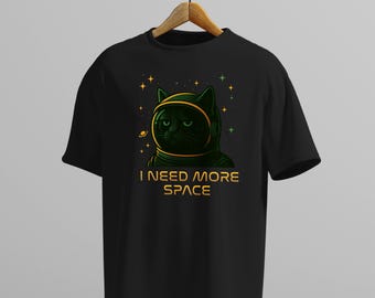 Funny Space Cat Shirt – I Need More Space Tee – Sarcastic Astronaut Kitty Graphic – Cosmic Cat Lover Gift – Black Galaxy Humor T-Shirt