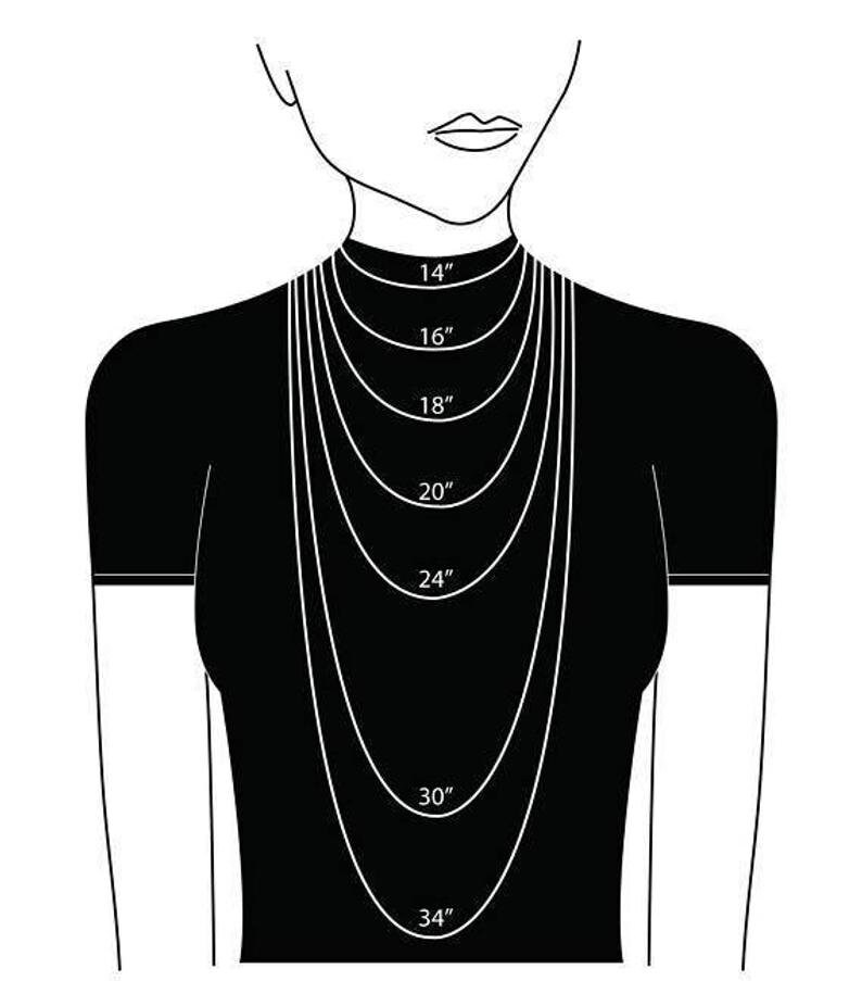 May include: A diagram showing different necklace lengths from 14 inches to 34 inches. The necklace lengths are shown on a black and white illustration of a person wearing a necklace.