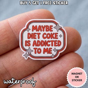 May include: A white, red, and gray sticker with the text "MAYBE DIET COKE IS ADDICTED TO ME." The sticker is in a retro style with star accents and the word "waterproof" at the bottom. The image also includes the text "BUY 5 GET 1 FREE STICKER."