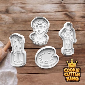 May include: White plastic cookie cutters in the shapes of art-related items. The cutters include a bust, a palette, a jar of paintbrushes, and a figure. The Cookie Cutter King logo is in the bottom right corner.