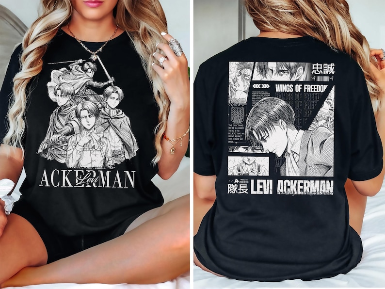 May include: Black t-shirt featuring a manga-style illustration of characters with the text "ACKERMAN" on the front. The back of the shirt displays a collage of images and text, including "WINGS OF FREEDOM" and "LEVI! ACKERMAN".