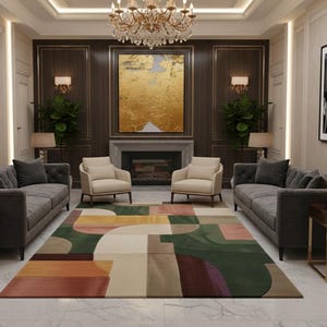 May include: A large rectangular area rug featuring a geometric pattern of overlapping shapes in shades of forest green, terracotta, cream, and deep purple, positioned in a living room with two gray sofas and two cream-colored armchairs.