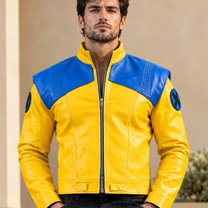 May include: A yellow and blue leather jacket featuring a high collar, a full-length front zipper, and a black X-Men logo patch on each shoulder. The garment has blue panels across the chest and shoulders with textured detailing and a yellow body.