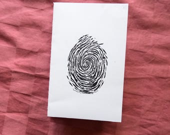 Revista de arte en acordeón con espirales fractales