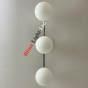 Mid Century Modern Brass Globe Wall Sconce - 26&quot; Wide