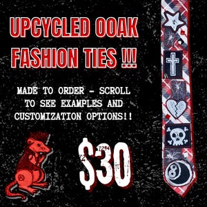 May include: A white ceramic mug with a black handle and the text "But First, Coffee" in a handwritten style. The mug is on a white surface. The mug is likely for hot beverages.