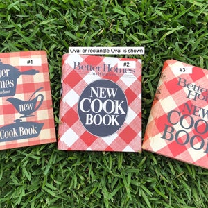May include: Three vintage Better Homes and Gardens New Cook Book hardback books with red and white gingham covers. The books are numbered 1, 2, and 3.