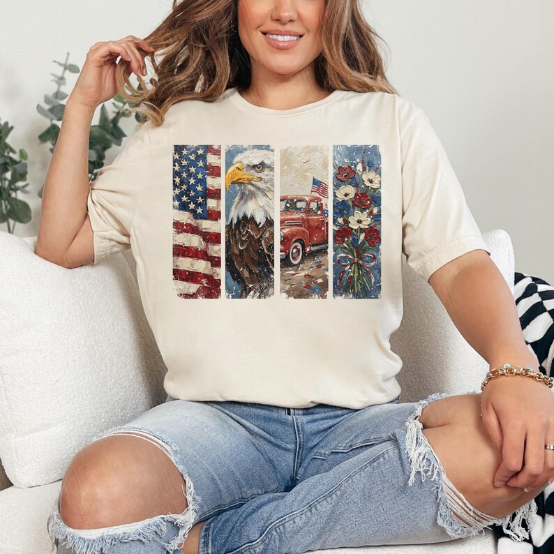 Puede incluir: Una camiseta color crema con un dise&ntilde;o patri&oacute;tico. El dise&ntilde;o incluye la bandera estadounidense, un &aacute;guila, una camioneta roja con una bandera y un ramo de flores. La camiseta la lleva una persona.