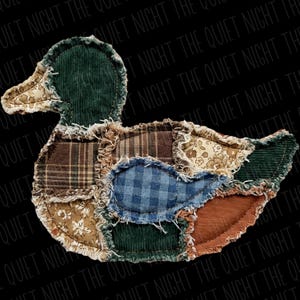 May include: A fabric duck applique featuring a patchwork design of various textiles including dark green corduroy, brown plaid, blue gingham, and floral patterns. The edges of each fabric piece are frayed and stitched together to form the duck shape.