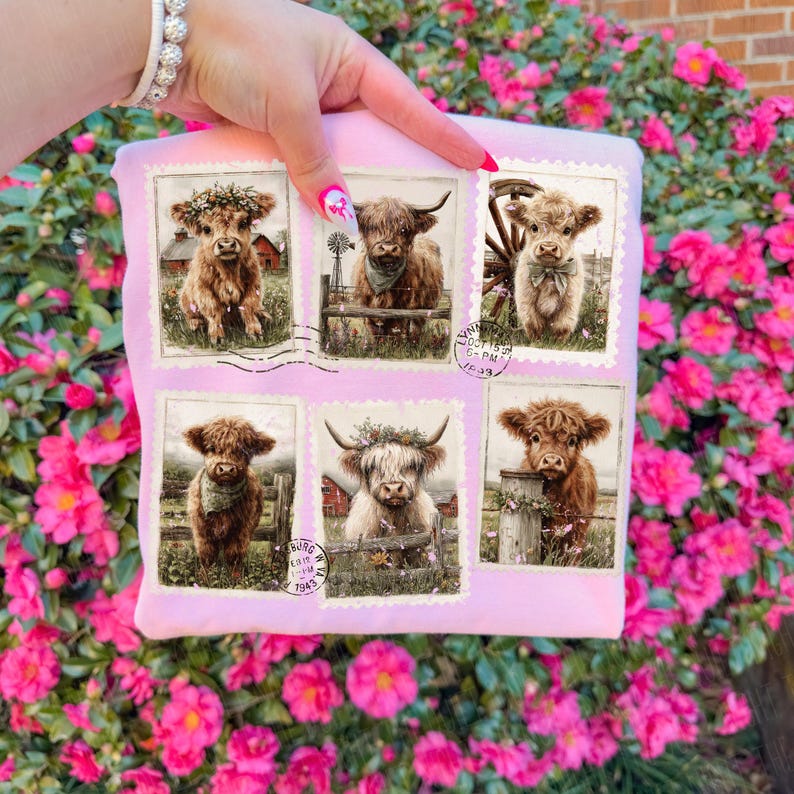 May include: A light pink pillow featuring six postage stamp-style images of Highland cows. Each image showcases a different cow with various accessories, such as floral crowns and scarves, set against a rural backdrop with barns and fences.