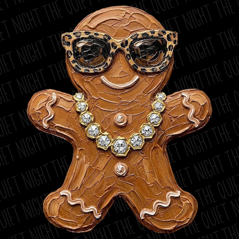 May include: A brown gingerbread person figure with a textured, impasto-style paint finish. The figure wears leopard-print sunglasses and a gold-toned necklace featuring clear, faceted stones. White icing-style wavy lines accent the limbs.