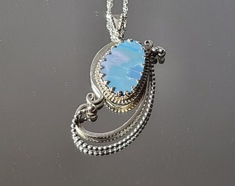 Original design, handcrafted, sterling silver piecework filigree pendant featuring lovely boulder opal