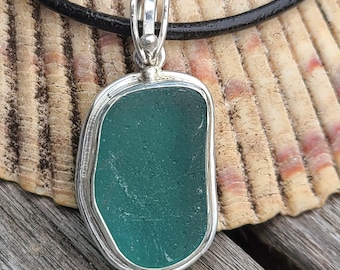 Handcrafted Newfoundland seaglass sterling silver pendant.
