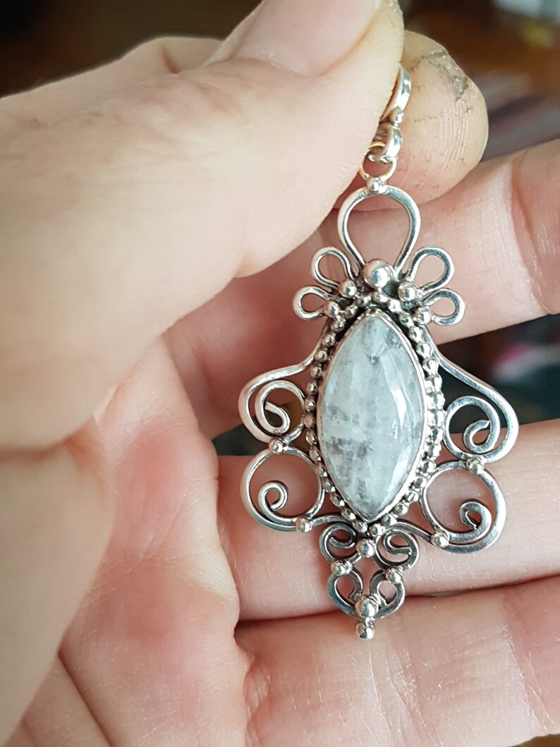 handcrafted sterling silver filigree pendant featuring a lovely iridescent moonstone cabochon. Original design