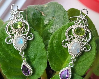 Handcrafted sterling silver filigree earrings featuring peridot, moonstone and amethyst dangles