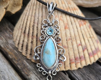 Handcrafted beautiful blue Larimer and blue topaz filigree sterling silver pendant.