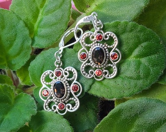 Sterling silver earrings with smoky quartz and 4 red garnet accents