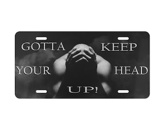 É preciso manter a cabeça erguida! Placa de carro