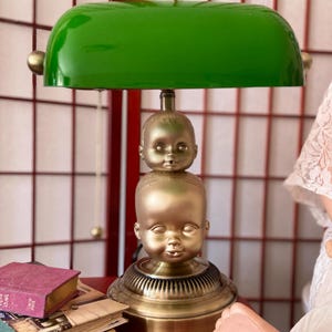 Creepy Baby Doll Banker&#39;s Lamp