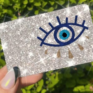 Carta di credito con debito Ultra Bling Reflective Skin, l'originale Ultra Ice Skin, da utilizzare solo con il rubinetto, informazioni sul retro (Eye Turkish)