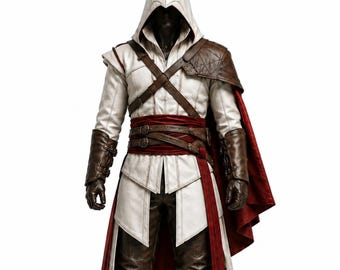 May include: A white hooded tunic with brown leather shoulder armor, brown leather gauntlets, and a red sash belt. The outfit includes a long red cape attached to the left shoulder, brown leather trousers, and intricate cross-body leather straps.