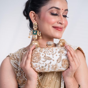 Ivory Embroidered Clutch with Gold Zardozi Work & Crystal Clasp | Velleso Bridal Purse | Elegant Party Bag, party bags,  bridal clutch