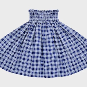 May include: A blue and white checked skirt featuring a smocked waistband. The skirt has a full, flowing shape, and the fabric is patterned with a classic gingham check. The skirt is suitable for casual wear.