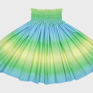 May include: A colourful skirt with a gradient effect. The top is gathered, light green, fading into blue, green, and yellow. The skirt is made of a lightweight material, ideal for warmer climates. The skirt's design is eye-catching.