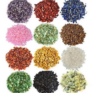 May include: A collection of small, colorful stones in various hues, including purple, red, blue, pink, green, brown, orange, yellow, and white. The stones are arranged in circular piles, showcasing their diverse colors and textures. Ideal for crafts and decorative purposes.