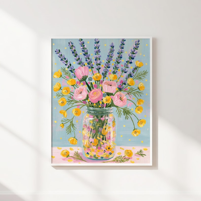 May include: A framed floral print featuring a mason jar filled with a colorful bouquet. The arrangement includes pink roses, yellow flowers, and purple lavender against a light blue background with yellow dots. The jar sits on a pink surface.