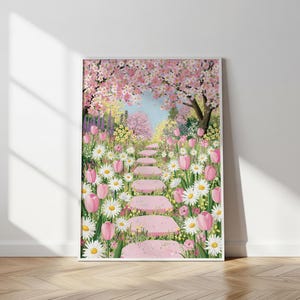 May include: A framed art print depicting a serene garden path. Pink stepping stones lead through a vibrant display of pink tulips, white daisies, and other colorful flowers. Overhead, a canopy of pink cherry blossoms frames a light blue sky.