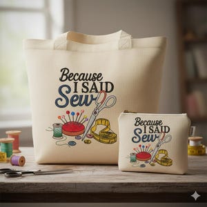 A beige tote bag with a printed design of sewing-related items and text, and a smaller tote bag with the same design and text.
